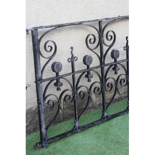 765 - AN ARTS AND CRAFTS STYLE GATE, early 20th century, in wrought and cast iron with a band of stylised ... 