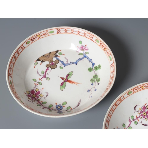 24 - TWO MARCOLINI MEISSEN PORCELAIN CANS AND SAUCERS, late 18th century, painted in polychrome enamels w... 