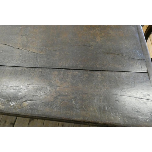 873 - A JOINED OAK DINING TABLE, 17th century and later, the cleated plank oblong top with lunette carved ... 