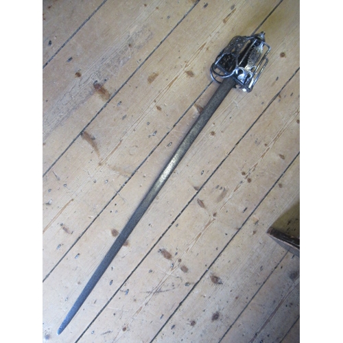 558 - A SCOTTISH BROADSWORD, c.1700, by Ferara, the 32