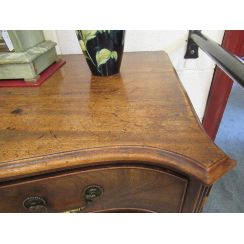 839 - A GEORGIAN MAHOGANY SERPENTINE CHEST, third quarter 18th century, the moulded edged top over four gr... 