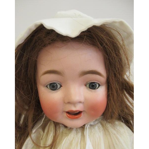 10 - A Catterfelder Puppenfabrik bisque socket head character doll, with blue glass sleeping eyes, open m... 