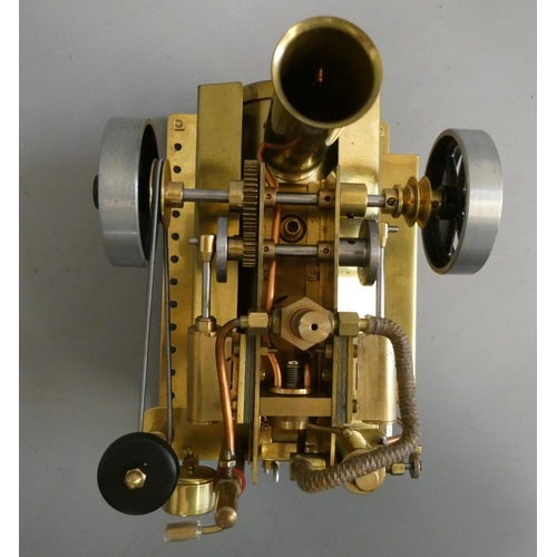 332 - Twin cylinder over-type steam engine, spirit fired boiler with water level plug, pressure gauge, bra... 