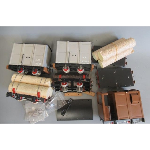 339 - Seven Mamod railway wagons including box van, wood wagon, two wagon bases and brake van, F (Est. plu... 