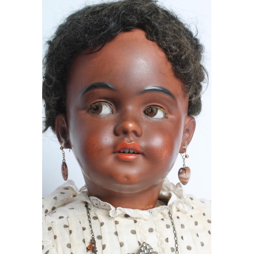 42 - A Simon & Halbig bisque socket head flirty doll, with brown glass sideways glancing eyes, open mouth... 