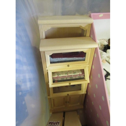 54 - A box of dolls house furniture, including wooden furniture, two metal and wood construction sewing m... 