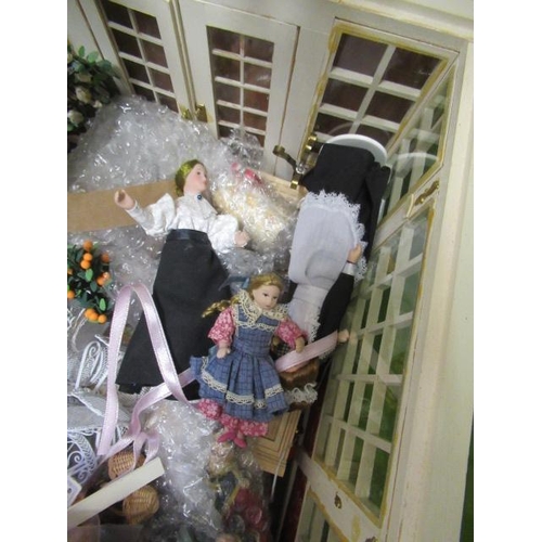 55 - A box of dolls house dolls and outside accessories, including a conservatory, wire work pagoda and p... 