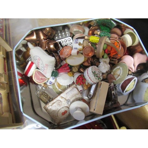 56 - A large box of dolls house furniture and accessories, including mainly wooden furniture, a metal dou... 