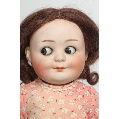 63 - A Gebruder Heubach googly eye bisque socket head doll, with blue glass sideways glancing and sleepin... 