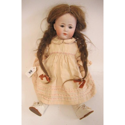 65 - A rare Gebruder Heubach bisque socket head doll, with brown glass sleeping eyes, closed mouth, wood ... 