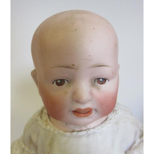 95 - Three bisque head solemn boy dolls, one 9