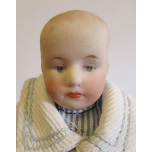 95 - Three bisque head solemn boy dolls, one 9