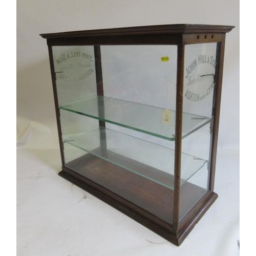 1035 - An early 20th century John Hill & Son Tudno Cake Factory Ashton Under Lyne display cabinet, with oak... 