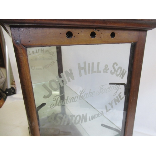 1035 - An early 20th century John Hill & Son Tudno Cake Factory Ashton Under Lyne display cabinet, with oak... 