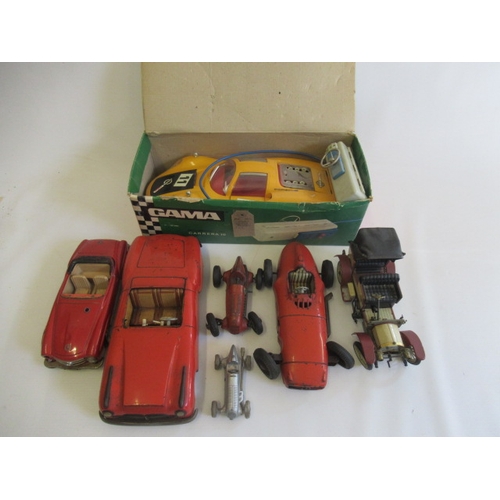 488 - Playworn tin cars by Schuco and others including Mercedes and race cars and a Gama battery operated ... 