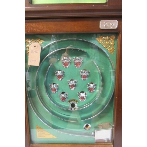 1021 - Modern Issue nine cup slot machine game, wooden case with chrome metal parts, E (Est. plus 24% premi... 