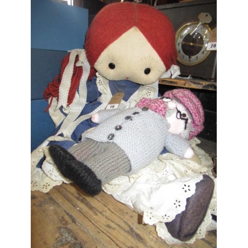 19 - LARGE RAG DOLL AND A KNITTED DOLL