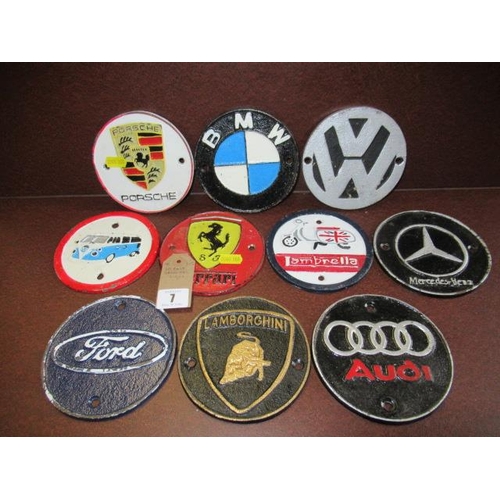 7 - TEN CAST IRON CAR SIGNS