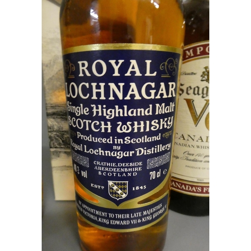 124 - 3 bottles of whisky, comprising 1 boxed 12 year old Royal Lochnagar, 1 bottle 12 year old Ballantine... 