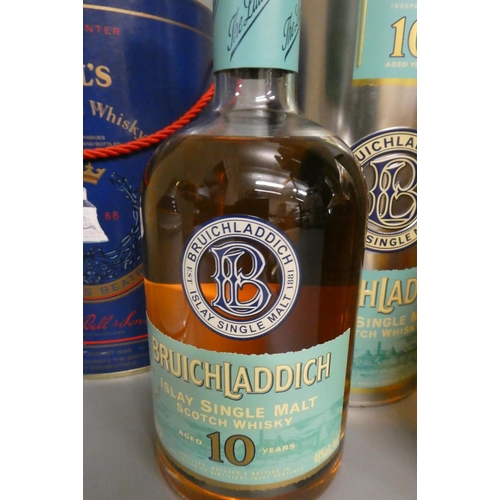 159 - 1 Bruichladdich 10 year old Islay single malt whisky, in tin, together with a Bells 1988 whisky deca... 