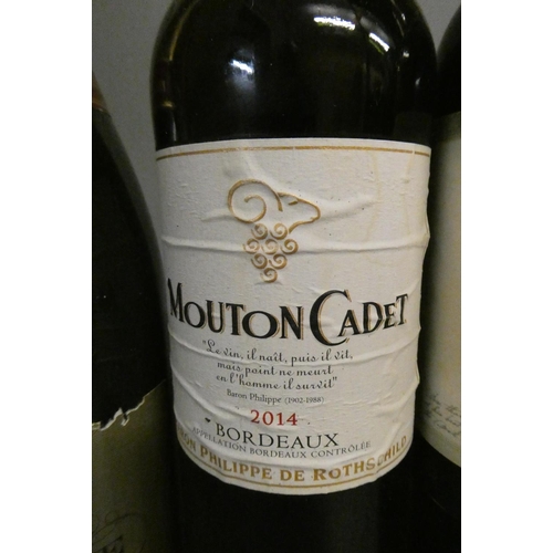 19 - 7 bottles of mixed alcohol, comprising 1 2014 Mouton Cadet, 1 2015 Casillero del Diablo, 1 500cl Gin... 