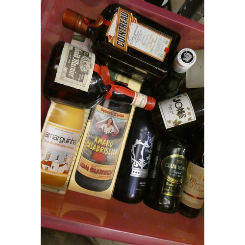 24 - A quantity of mixed spirits & liqueurs, including Harveys coronation edition Bristol Cream, Club Roy... 