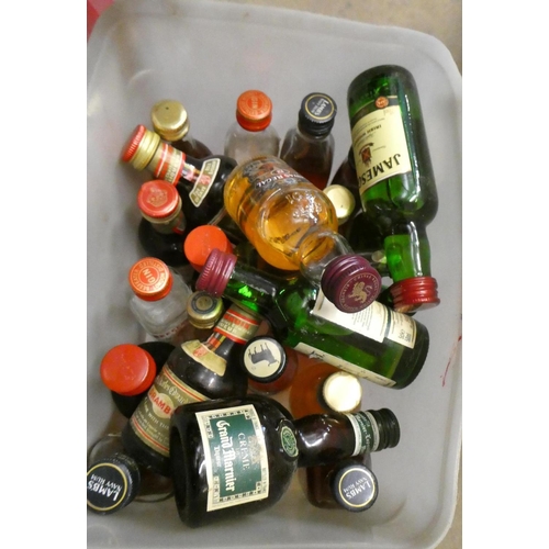 24 - A quantity of mixed spirits & liqueurs, including Harveys coronation edition Bristol Cream, Club Roy... 