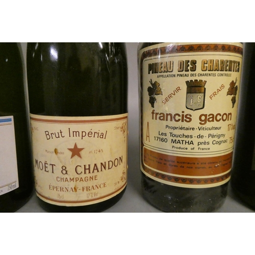 26 - 4 bottles comprising 1 Moet & Chandon Brut Imperial champagne, 1 Pol Remy brut, 1 Pineau des Charent... 