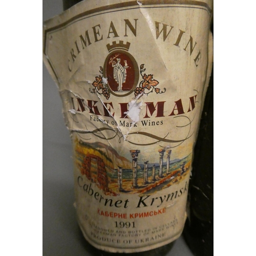 34 - 1 bottle Offley LBV 1985 port, 1 bottle 1991 Inkerman Cabernet Krymske, 1 antique cognac bottle, pos... 