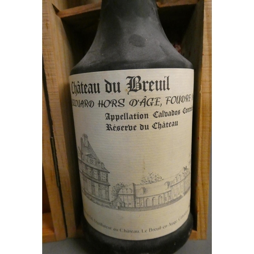 63 - 1 bottle Chateau du Breuil, calvados bizouard hors d'age, no. 23, 42%, boxed, together with a Courvo... 