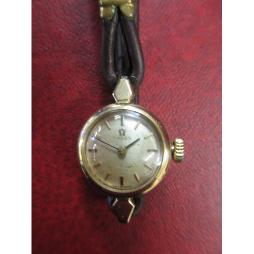 220 - LADY'S 9CT GOLD OMEGA 24 JEWEL AUTOMATIC WRISTWATCH