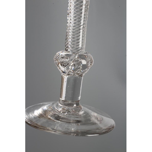 105 - A WINE GLASS, mid 18th century, the bell bowl on a composite multiple spiral air twist stem with con... 