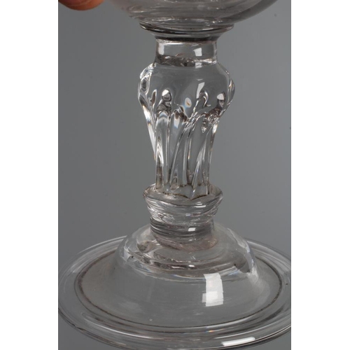 108 - A GLASS GOBLET, late 18th century, the plain double ogee bowl on a wrythen moulded flared cylindrica... 