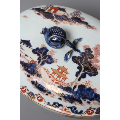 11 - A CHINESE IMARI PORCELAIN TUREEN AND COVER of oval form with pomegranate knop and two rabbit head lu... 