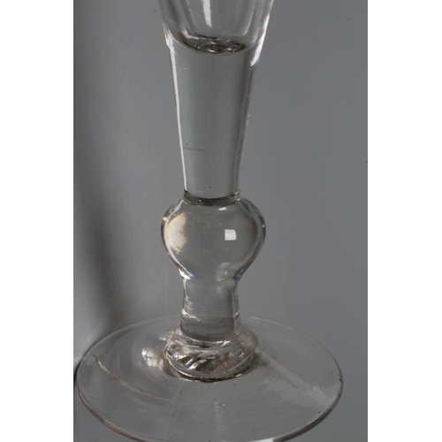 116 - A WINE GLASS, mid 18th century, the drawn trumpet bowl on single knopped plain stem and conical foot... 