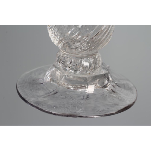 117 - A JELLY GLASS, mid 18th century, the wrythen moulded double ogee bowl on a teared knop and lobed foo... 