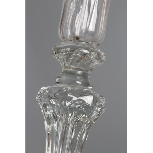 118 - A GLASS CANDLESTICK, mid 18th century, the moulded ribbed cylindrical socket with dished drip-pan, i... 