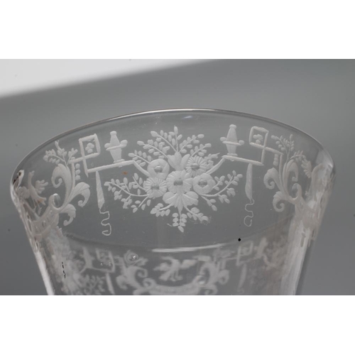 121 - A WINE GLASS, early 18th century, the round funnel bowl engraved with swags of flowers and rocaille ... 