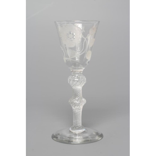 124 - A JACOBITE WINE GLASS, mid 18th century, the round funnel bowl engraved with a rose with one semi-op... 