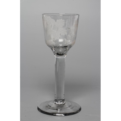 125 - A JACOBITE WINE GLASS, mid 18th century, the ogee bowl engraved with oak leaves, a moth and other in... 