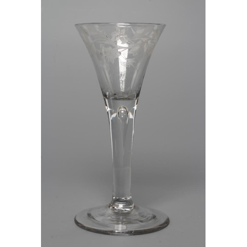 126 - A JACOBITE WINE GLASS, mid 18th century, the trumpet bowl engraved with a rim of rosebuds, daffodils... 