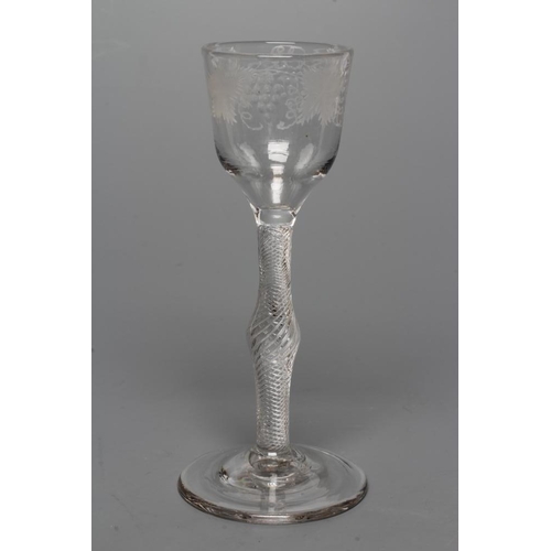 128 - A CORDIAL GLASS, mid 18th century, the ogee bowl engraved with a band of fruiting vines, on a multip... 