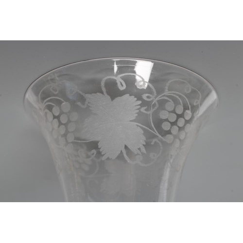 143 - A WINE GLASS, mid 18th century, the bell bowl engraved with a band of fruiting vine on a composite a... 