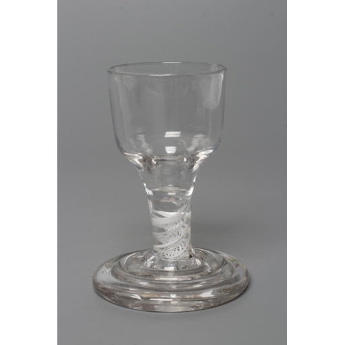 147 - A FIRING GLASS, mid 18th century, the ogee bowl on a short double series opaque twist stem and ribbe... 