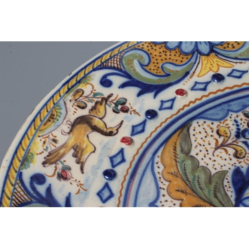 15 - A SPANISH MAIOLICA CHARGER, probably 19th century Talavera, of circular form with central raised bos... 