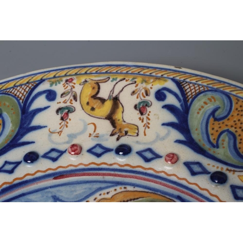 15 - A SPANISH MAIOLICA CHARGER, probably 19th century Talavera, of circular form with central raised bos... 