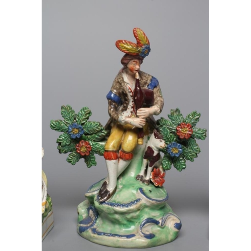 31 - A STAFFORDSHIRE PEARLWARE FIGURE GROUP, c.1820, modelled after a Derby original of a male hairdresse... 