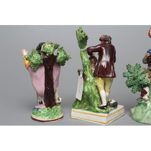 31 - A STAFFORDSHIRE PEARLWARE FIGURE GROUP, c.1820, modelled after a Derby original of a male hairdresse... 