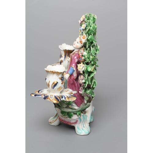 33 - A BOW PORCELAIN FIGURAL CANDELABRUM, c.1760, modelled as a young Turkish girl wearing a puce turban ... 