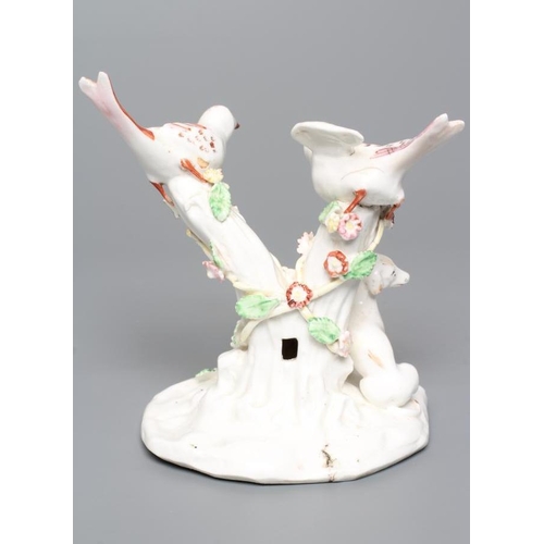 34 - A BOW PORCELAIN GROUP, c.1760, modelled as two birds perched upon flower encrusted branches with a d... 